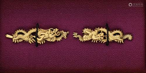 A PAIR OF GILT SILVER GOTO SCHOOL DRAGON MENUKI