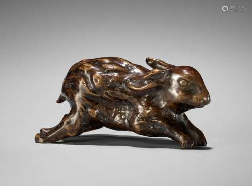 † AN UNUSUAL ROOTWOOD OKIMONO OF A LEAPING HARE