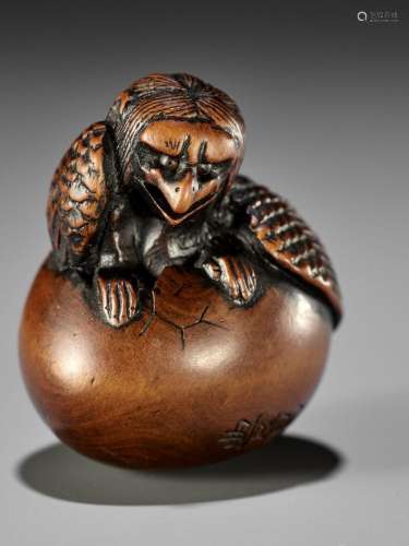 NAITO TOYOMASA: A FINE WOOD NETSUKE OF A HATCHING TENGU (TEN...