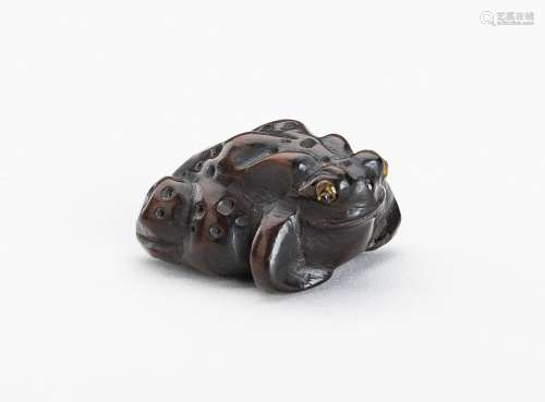 A WOOD NETSUKE OF A TOAD, MEIJI