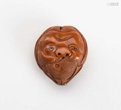 A KURUMI MASK NETSUKE OF HYOTTOKO