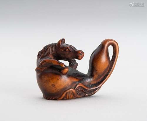 A SMALL SIGNED BOXWOOD NETSUKE OF CHOKARO\'S HORSE IN A GOUR...