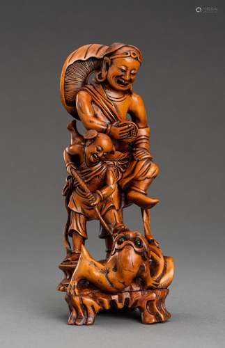 A WOOD FIGURE OF LIU HAI CATCHING THE THREE-LEGGED TOAD, 190...