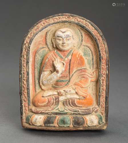 A POLYCHROME TERRACOTTA TSA TSA OF A YOUTHFUL SPIRITUAL LEAD...