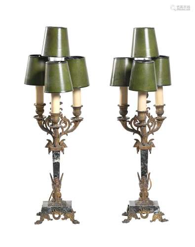 A PAIR OF FRENCH ORMOLU MOUNTED FOUR LIGHT CANDELABRA