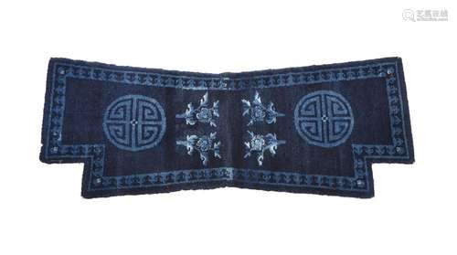 A CHINESE INDIGO SADDLE RUG