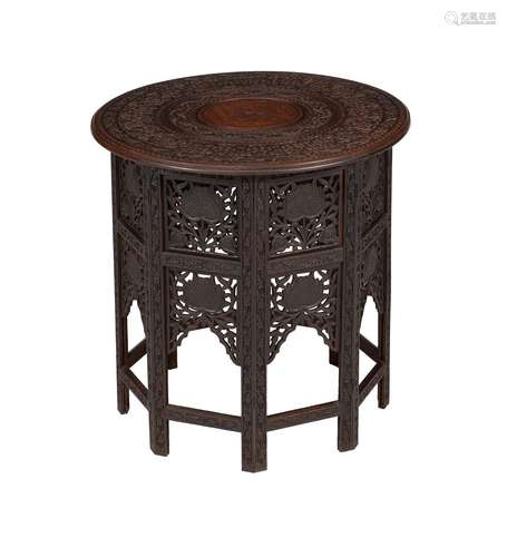 A CARVED HARDWOOD TABLE IN MOORISH TASTE