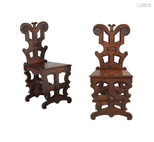 A PAIR OF VICTORIAN OAK HALL CHAIRS