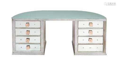 A METAL CLAD AND MIRRORED DRESSING TABLE