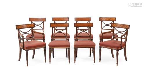 A SET OF EIGHT GEORGE III MAHOGANY AND SATINWOOD DINING CHAI...
