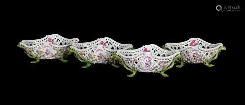 A SET OF FOUR HEREND TWIN HANDLED PIERCED AND FLOWER ENCRUST...