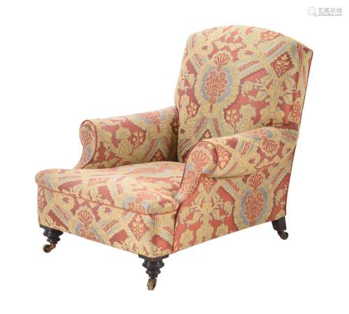 A VICTORIAN UPHOLSTERED ARMCHAIR