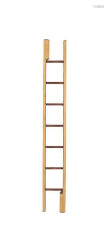 A BRASS STUDDED LEATHER CLAD METAMORPHIC POLE LADDER