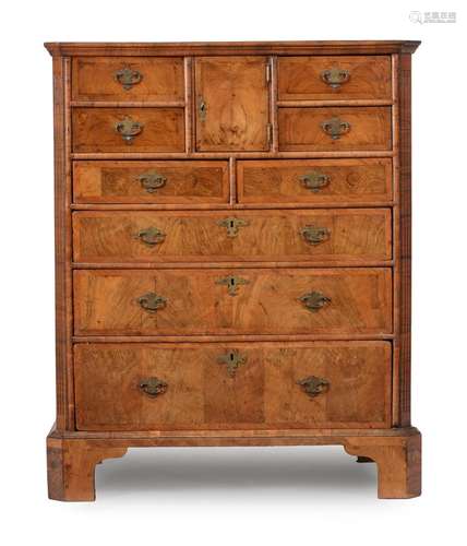 A WALNUT CHEST OF DRAWERS