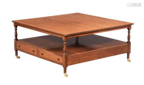 A MAHOGANY LOW OCCASIONAL TABLE IN REGENCY STYLE