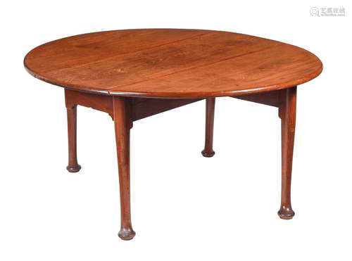 A GEORGE III MAHOGANY DROP LEAF TABLE