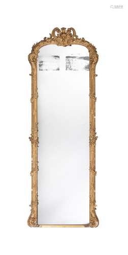 A GILTWOOD AND COMPOSITION WALL MIRROR