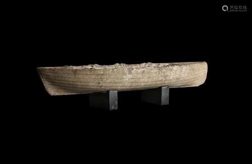 AN UNUSUAL CARVED MARBLE MODEL OF A BOAT, POSSIBLY A WHALEBO...