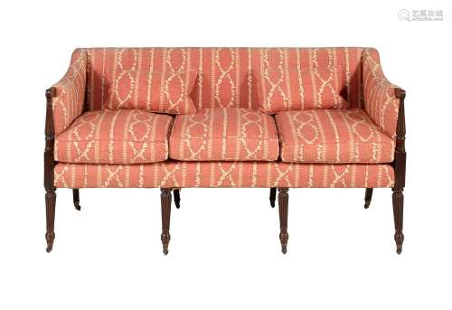 A MAHOGANY AND UPHOLSTED SOFA IN LATE GEORGE III STYLE