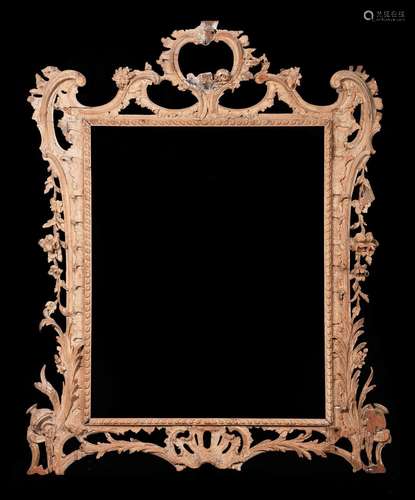 A CARVED PINE OVERMANTEL OR WALL MIRROR FRAME