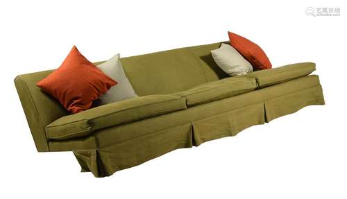 A LARGE GREEN UPHOLSTERED SOFA OR BANQUETTE