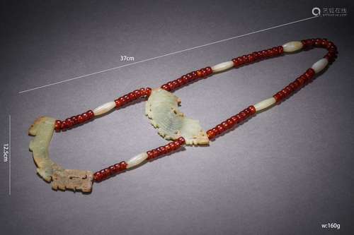 A Chinese Agate Necklace with Carved Jade Plaques