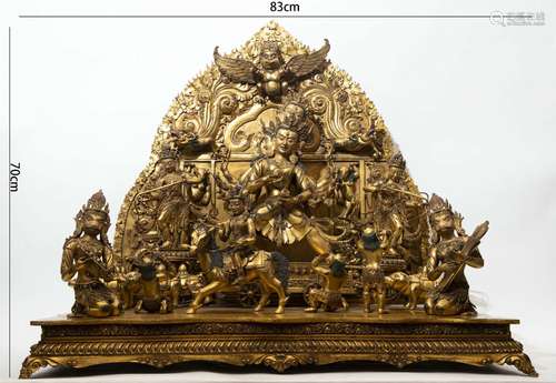 A Tibetan Bronze-gilt Deity with Attendants