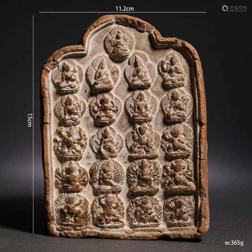 A Tibetan Pottery Tsa-tsa Plaque of Deities Group