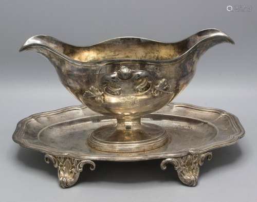 Sauciere auf Presentoir / A silver sauce boat on presenter, ...