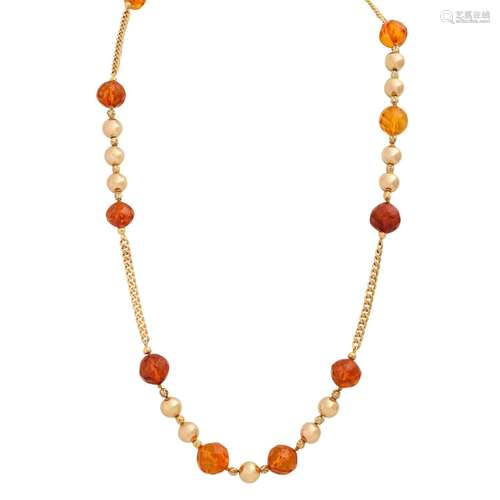 Gold necklace with faceted amber beads