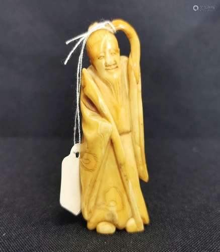 NETSUKE: STANDING MAN WITH STICK