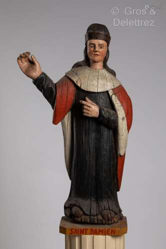 Sculpture en bois polychrome représentant St Damien en tenue...