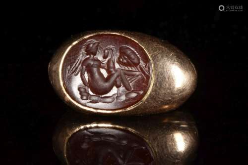 ROMAN CARNELIAN INTAGLIO WITH LEDA AND SWAN IN GOLD RING
