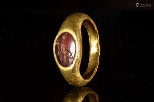 ROMAN GOLD RING AND CARNELIAN INTAGLIO DEPICTING FORTUNA RED...