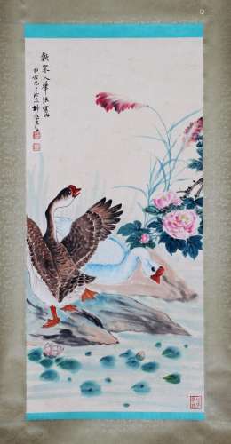 A CHINESE PAINTING OF GEESE AND FLOWERS