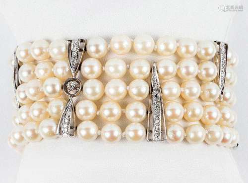 Brazalete ancho vintage formado por cinco filas de perlas cu...