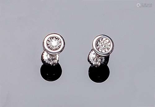 Pendientes solitarios en oro blanco con un diamante talla br...