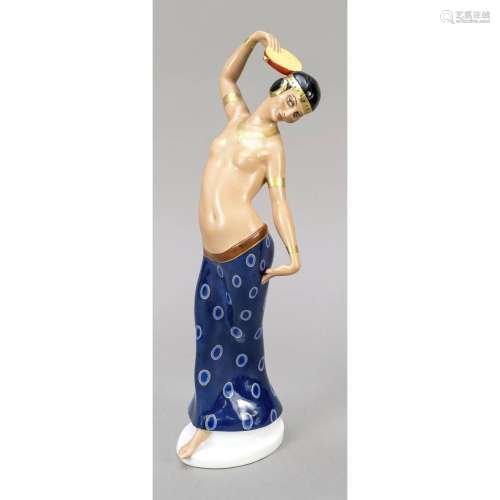 Oriental dancer with tambourine,