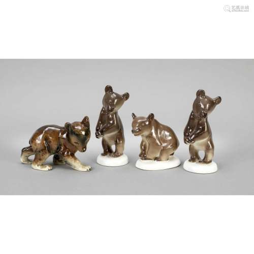 Four bear figures, 2 standing and