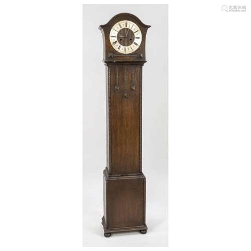 small grandfather clock with table