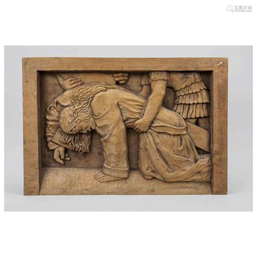 Wooden relief with a scene from th