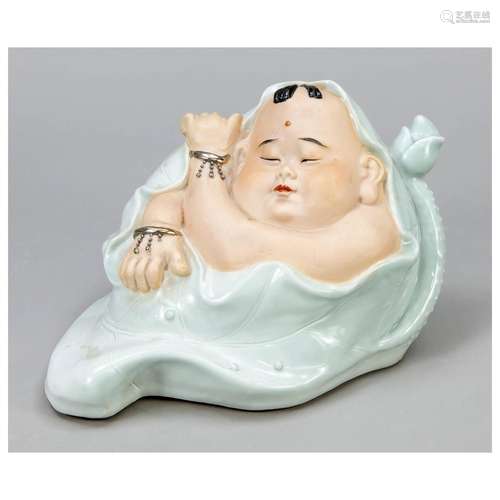 Porcelain figure of baby in lotus l