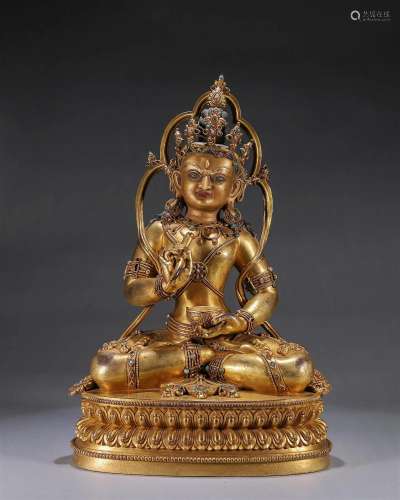 A gilding copper gem-inlaid buddha statue