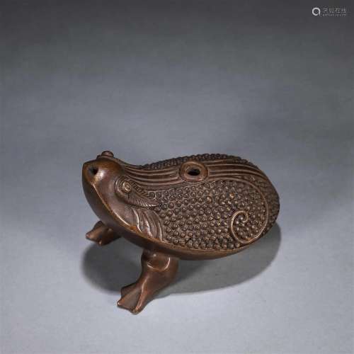 A three-legged toad shaped copper water pot