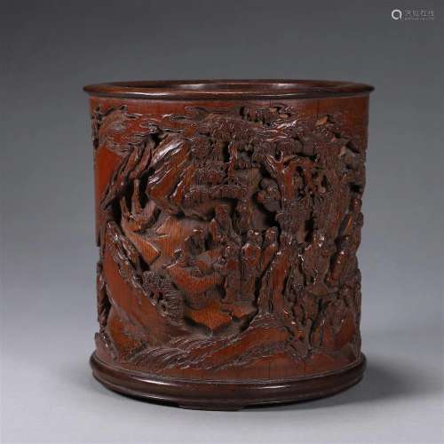 A figure carved bamboo brush pot
