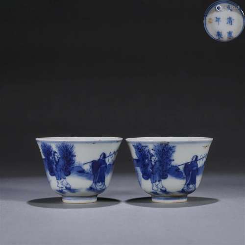 A pair of blue and white figure porcelain cups