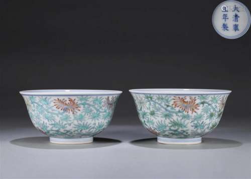 A pair of interlocking flower patterned doucai porcelain bow...