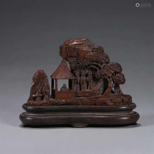 A landscape and figure carved bamboo ornament