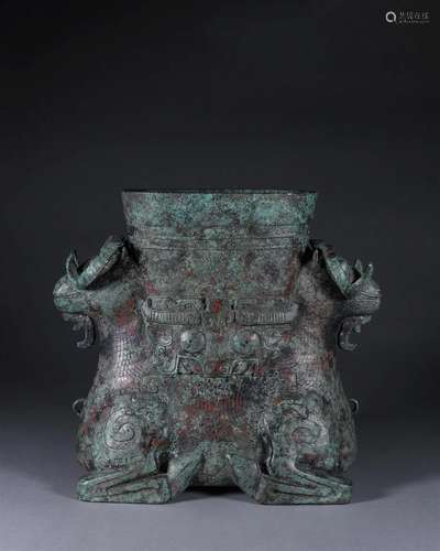 A beast face patterned bronze goat head zun