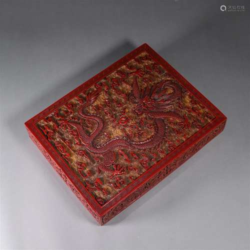 A cloud and dragon carved red lacquer box